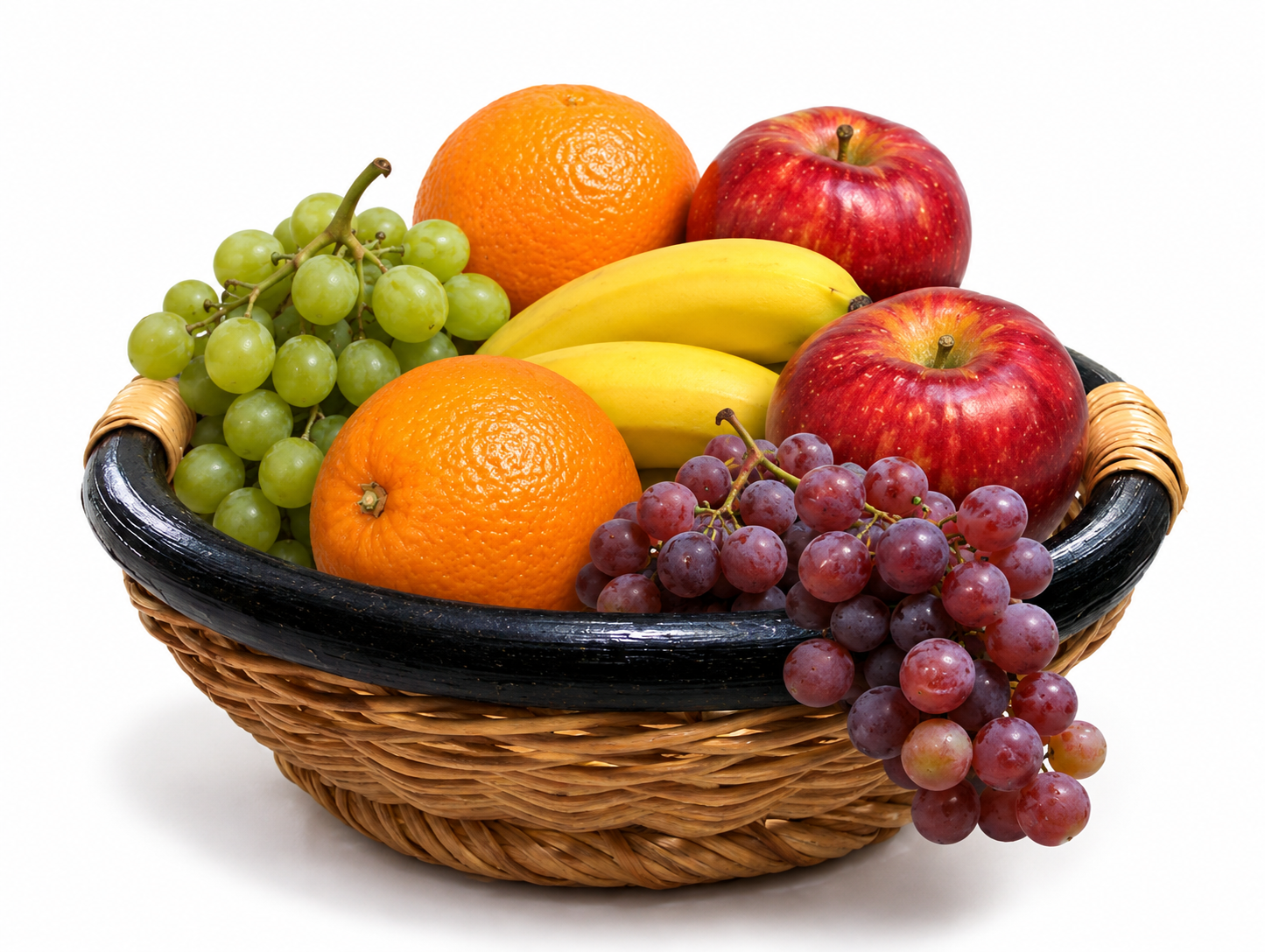 Basket filled with apples, oranges, bananas, and grapes
